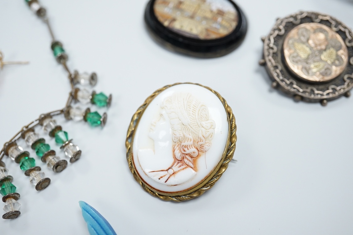 A group of mainly antique jewellery including micro-mosaic plaque, a pair of 9ct and coral drop earrings, a silver bangle, a George V enamel and silver brooch(a.f.) etc.